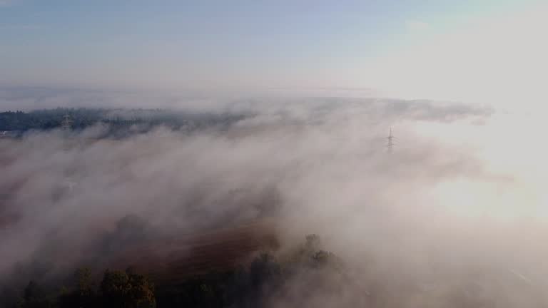 Over the clouds magical fog cinematic droneshot