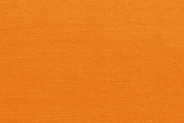 istock Orange cotton fabric cloth texture for background, natural textile pattern. 2151074487
