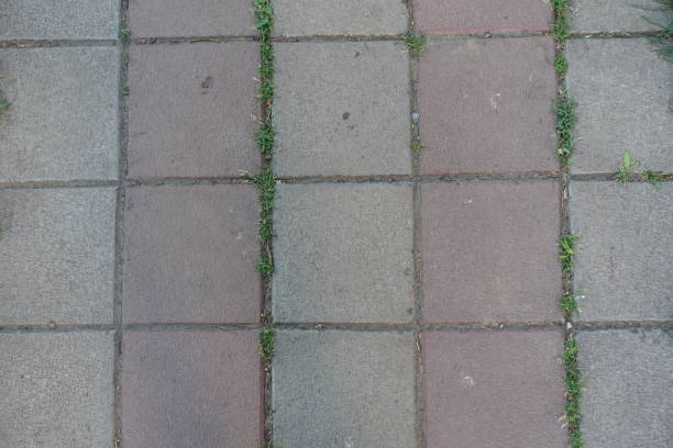 istock Texture of stack bond brick like gray and pink concrete pavement 2151075447