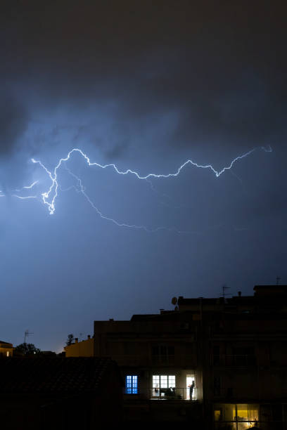 istock Lightning bolts crossing the night sky 2151077869