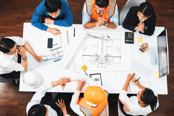 istock Diverse group of civil engineer and client working on architect. Prudent 2151080648