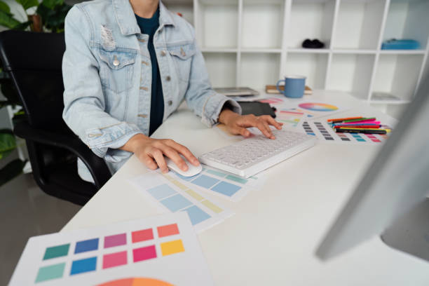 istock Graphic UI designer work on computer laptop and with graphic, working after brainstorming unique design with professional developer UX team 2151083822