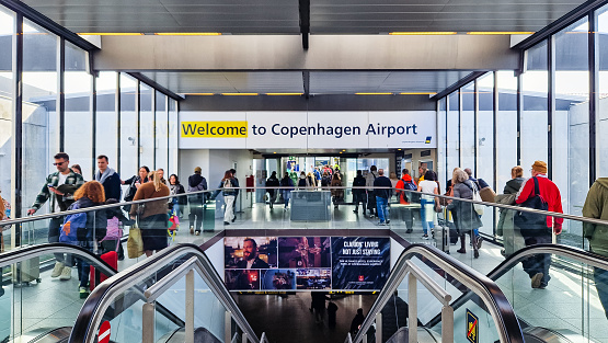Copenhagen, Denmark - April 7, 2024: People walking inside Copenhagen airport.