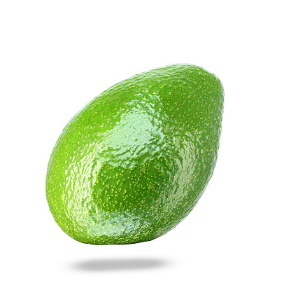 green ripe avocado on white background
