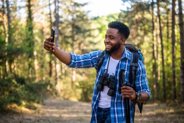 istock Man hiking and making selfie 2151085487