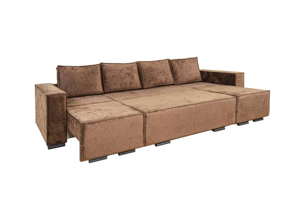 istock Brown unfolded sofa with velor fabric pillows isolated on a white background. Cushioned furniture. 2151086188