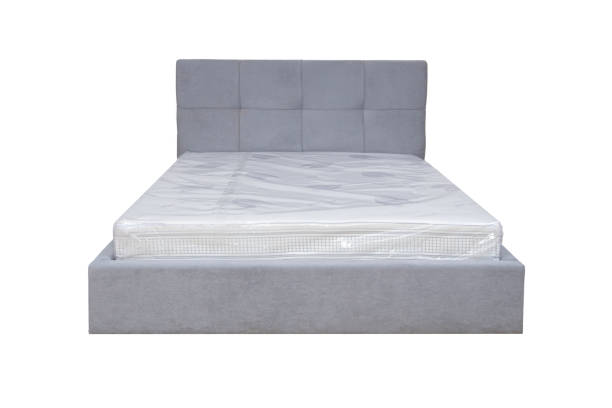 istock Double bed with soft headboard. Cushioned furniture. 2151086307