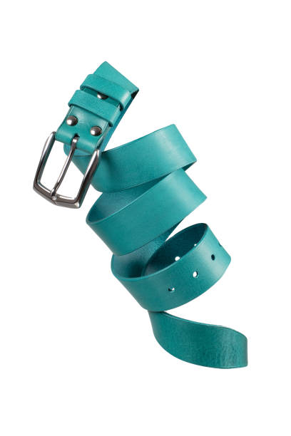 Green leather belt coiled on a white background.