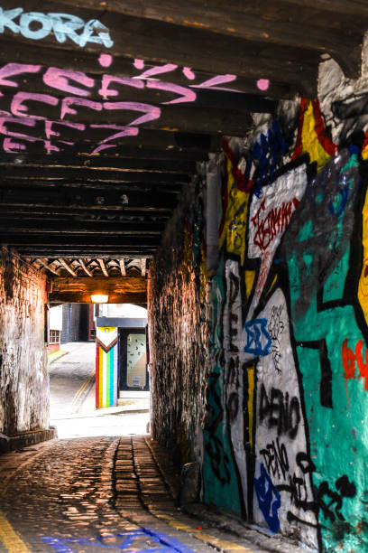 Prague, Czech Republic - July 4, 2025: Colourful graffiti covering walls and staircase of the Vltavska pedestrian underpass in Prague