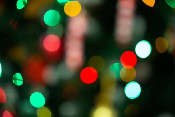 istock Colorful Christmas spots sideways from the Christmas tree garland. 2151087663
