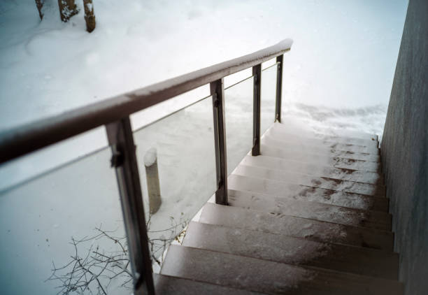 slippery outside stairs covered with snow, no people, winter scene