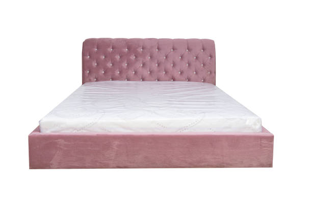 Double bed with soft headboard. Cushioned furniture.