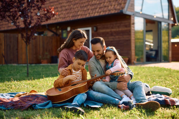 istock Happy family spending a spring day together in nature. 2151088872