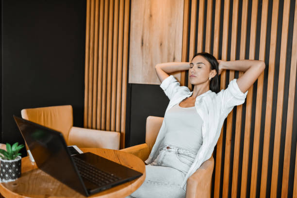 istock Female System Administrator Trying To Calm Herself During Tough Work Day 2151089130