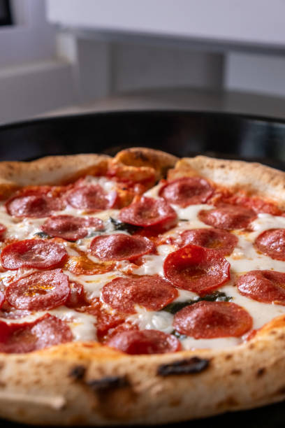 istock italian pizza in oven on rotating 2151089184