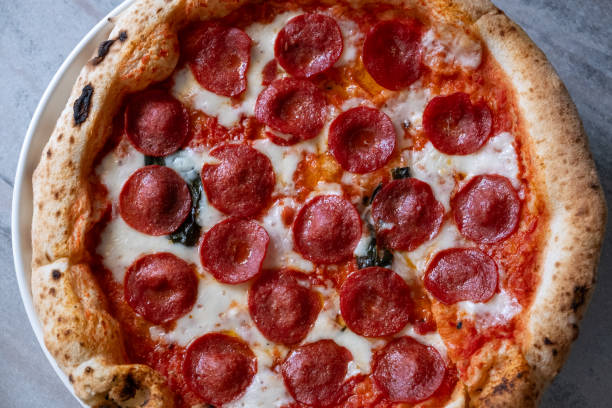 istock italian pizza in oven on rotating 2151089186