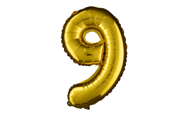 istock Helium gold balloon number nine 9 isolated on white. 2151089211