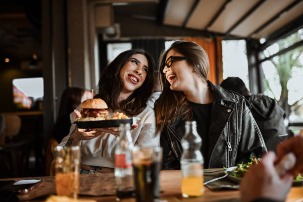 Smiling Female Happy About Burger Gift From Girlfriend