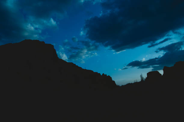 istock large, beautiful silhouette of sandy rocks, sunset with rocks 2151091432