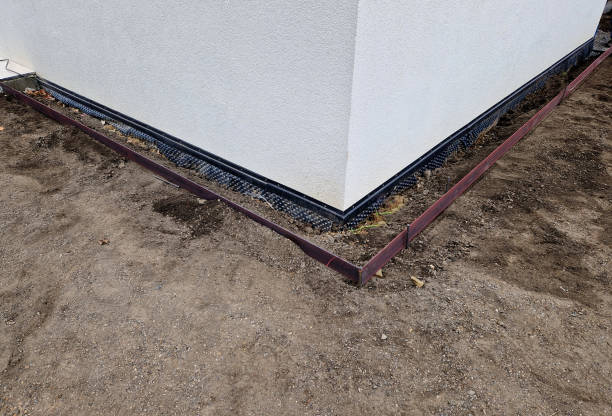around house it is always necessary to create a gutter path made of gravel and pebbles. serves to absorb water and ventilate  walls of the house. installation of curb steel sheets. membrane foil, stud