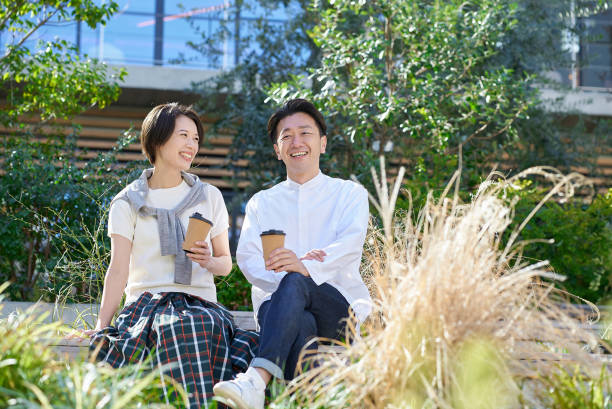 istock Man and woman talking intimately 2151092461