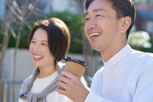 istock Man and woman talking intimately 2151092484