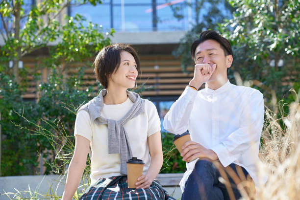 istock Man and woman talking intimately 2151092580