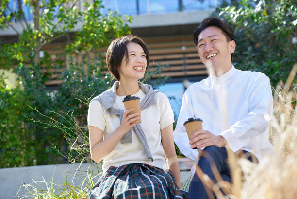 istock Man and woman talking intimately 2151092588