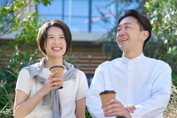 istock Man and woman talking intimately 2151092723