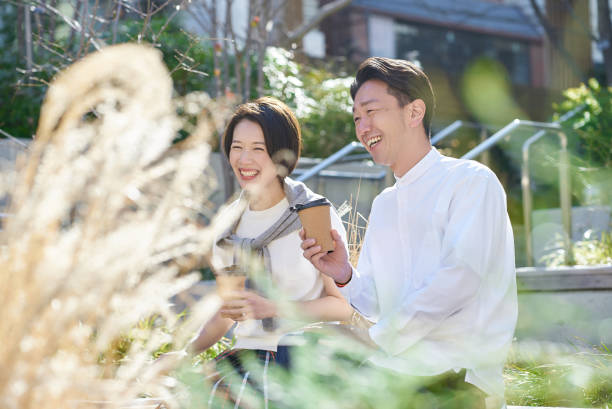 istock Man and woman talking intimately 2151092747