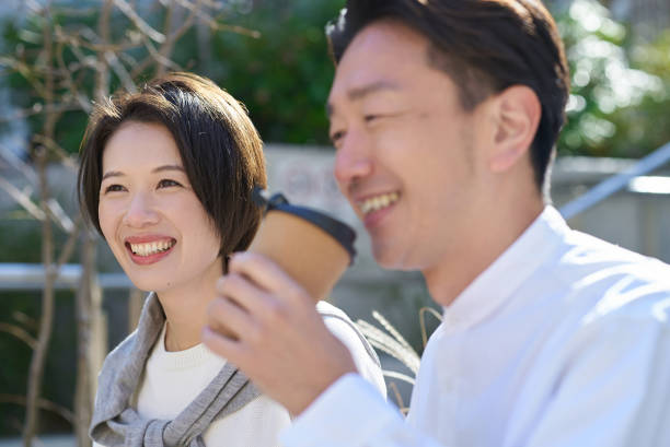 istock Man and woman talking intimately 2151092796