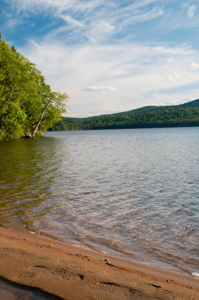 istock Scenic lake beach scene 2151092833