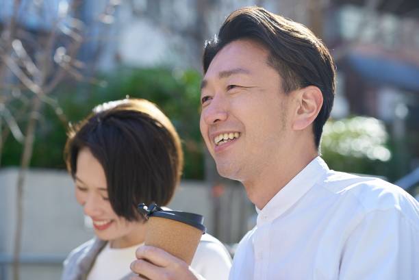 istock Man and woman talking intimately 2151092863