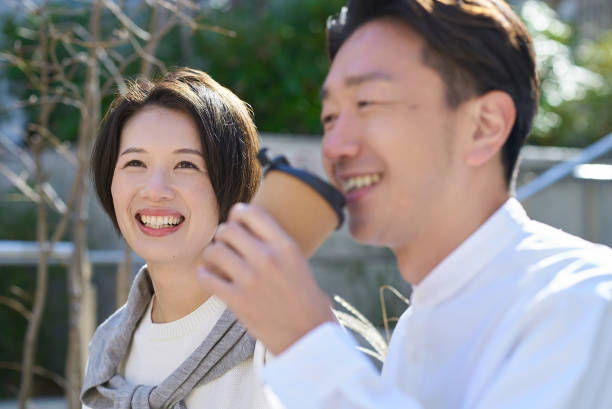 istock Man and woman talking intimately 2151092878