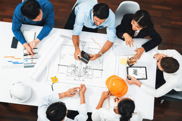 istock Diverse group of civil engineer and client working on architect. Prudent 2151093031