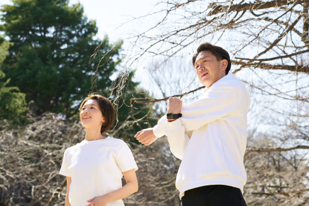 istock Man and woman doing warm-up exercises 2151093131