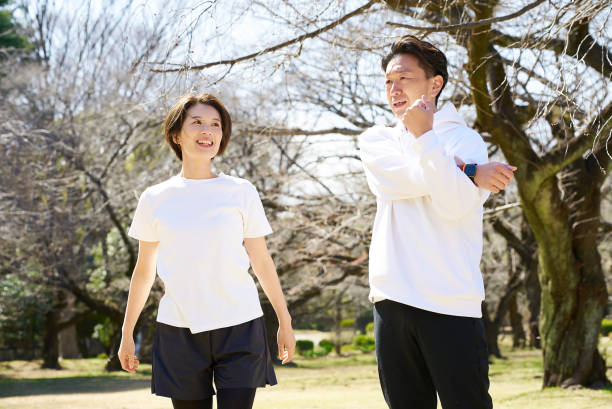 istock Man and woman doing warm-up exercises 2151093252