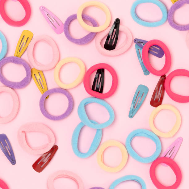 istock Many small multicolored hair scrunchies and clips. 2151094193