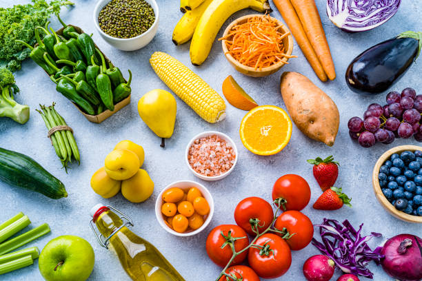 istock Healthy rainbow colored fruits and vegetables background 2151094361