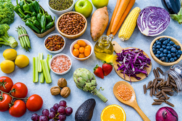 istock Fresh and healthy multicolored fruits and vegetables background 2151094366