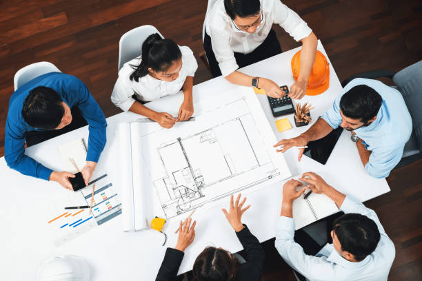 istock Diverse group of civil engineer and client working on architect. Prudent 2151094399