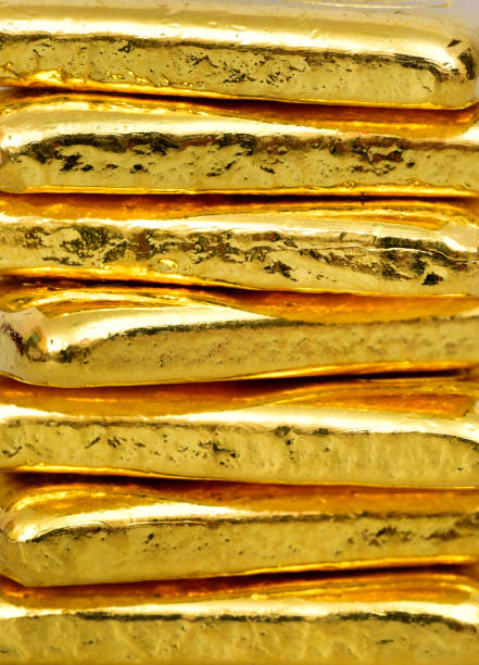 Close up photo a gold bars on white background