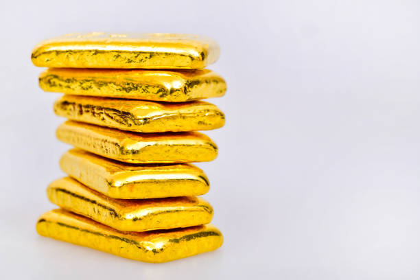 Close up photo a gold bars on white background