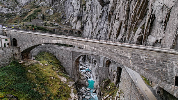 istock Devil's Bridge (Teufelsbrucke) over of Schollenen Gorge (Schollenenschlucht) in Andermatt, Switzerland 2151095519