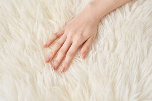 istock A hand touches the fluffy fabric 2151097688