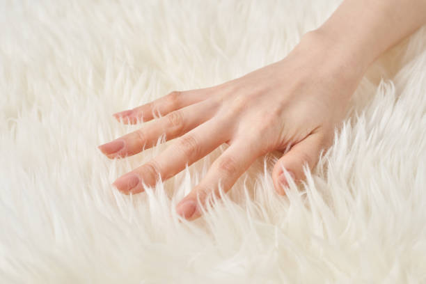 istock A hand touches the fluffy fabric 2151097694