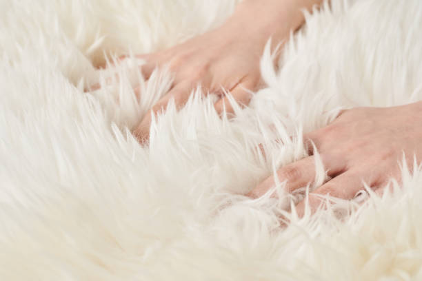 istock A hand touches the fluffy fabric 2151097713