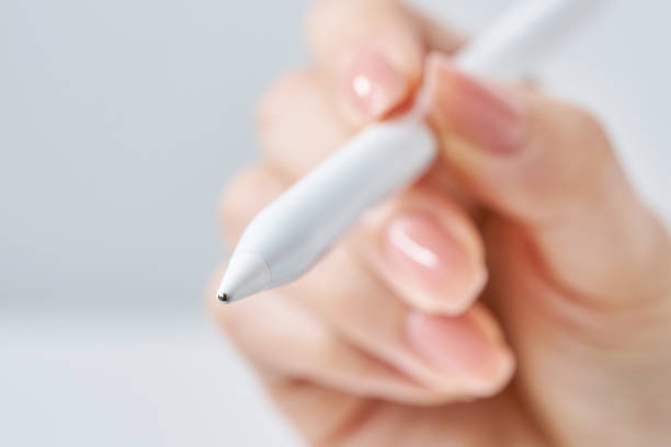 istock a woman operating a stylus pen 2151098102