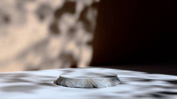 istock Stone podium product presentation with leaves shadow on the wall background. 2151098202