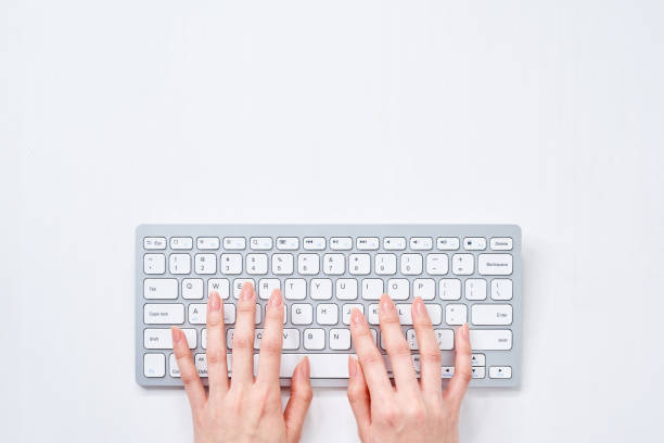 istock a woman typing on a keyboard 2151098204